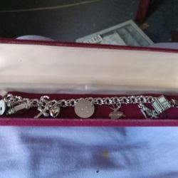 Sterling Silver Charm Bracelet With 9 Charms