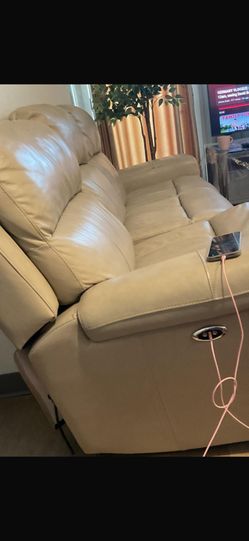 Cream Color leather Couches Two 3 Seater And a One Seater