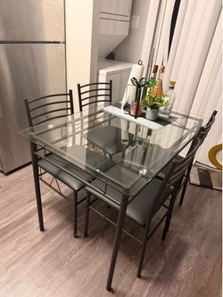 Dinning table with 4 chairs - $110