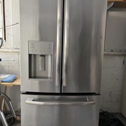 GE Stainless Refrigerator With French Doors