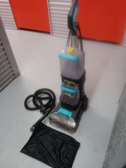 This is a brissel carpet cleaner. Used 3 times. In great working condition.