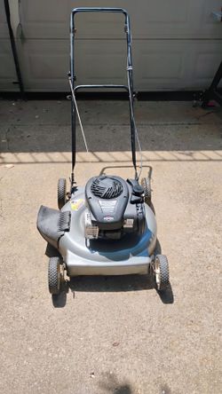 Bolens 20-inch push lawn mower powered by a Briggs & Stratton 450E Series (125cc) gas engine.(OBO)
