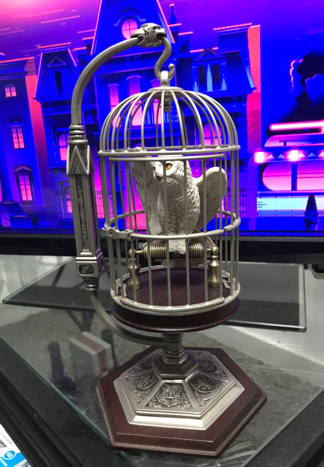 Harry Potters miniature hedwig and cage collectible