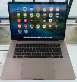 MACBOOK PRO 15” WITH TOUCH BAR