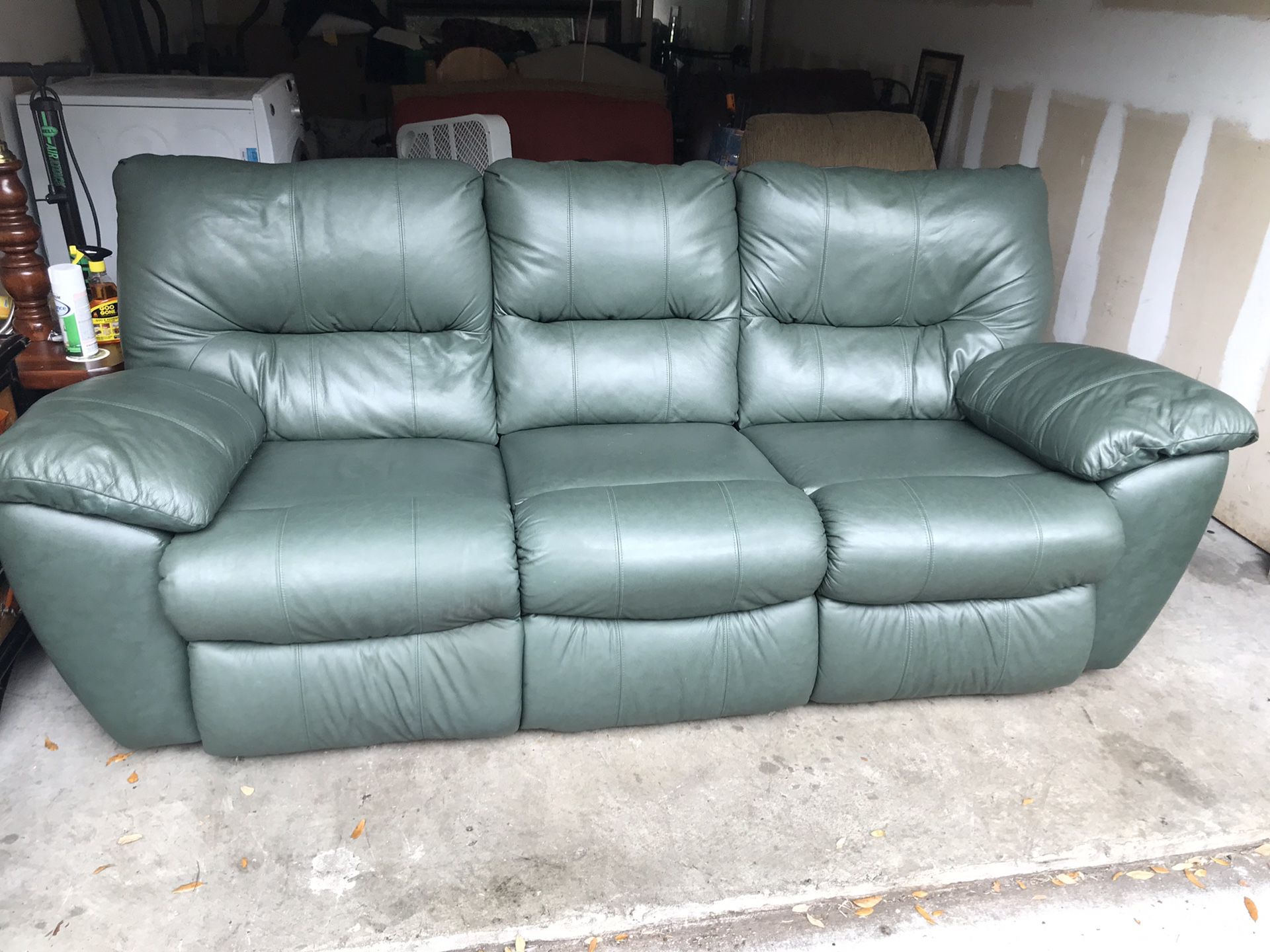 Dark green Plush recliner LEATHER SOFA in good condition