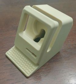 Apple watch holder. Mini Apple mac display.