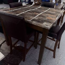 Brown Faux Marble Dining Table $299