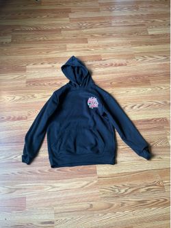 black and red multicolored hoodie with design on the back