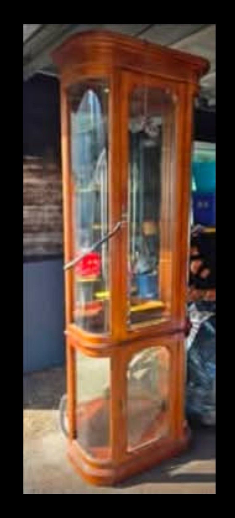 Curio Cabinet With Multiple Shelves And Lighting