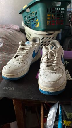 White and blue Air Force 1s