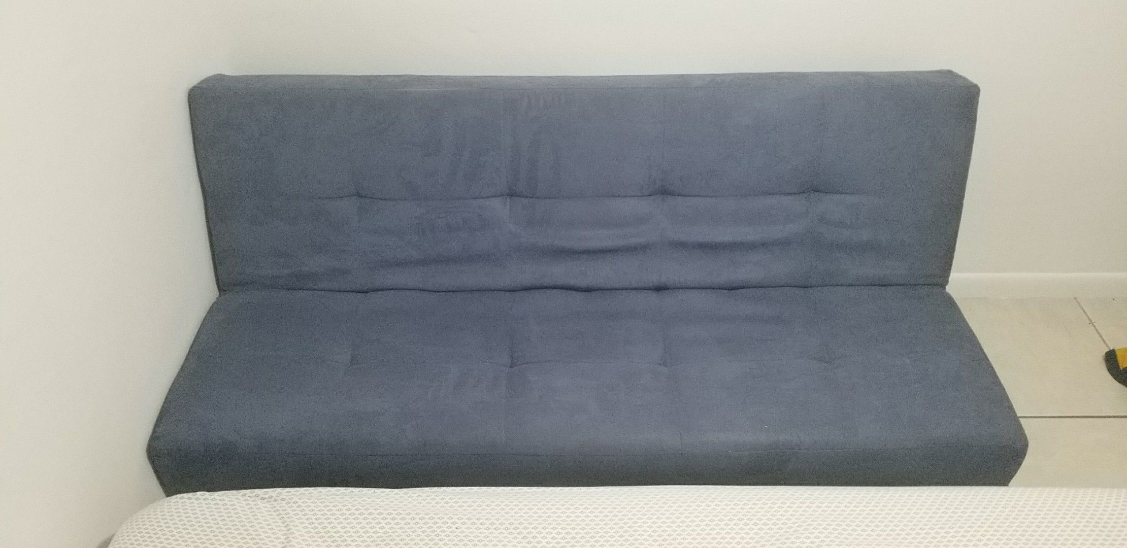 Blue suede futon with black frame