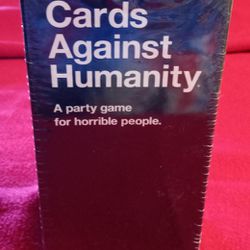 New and still sealed! Cards Against Huanity card game, loads of laughs for your next party