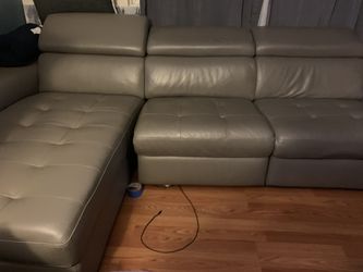 L shaped grey leather recliner