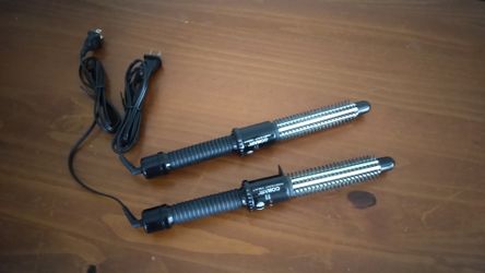 Clairol brand curling iron s never used