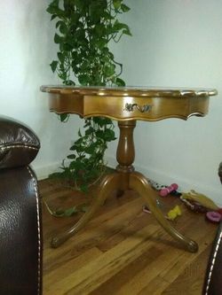 Vintage Antique table with leather top great condition