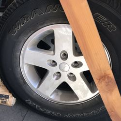 Jeep Wrangler factory tires. Less than 2000 miles.
