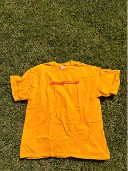 Yellow Nike shirt