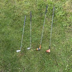 4 Golf Clubs 