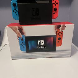 Nintendo Switch 32GB Gray Console with Neon Red and Neon Blue Joy-Con