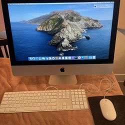 2013 Apple iMac 21.5-inch All In One 2.7ghz Quad Core i5 8gb Memory 256gb Ssd. Catalina macOS. Couple Small Dents On The Back.