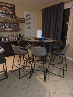 Pub table and 6 chairs