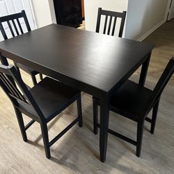 IKEA Dining Table + 4 Chairs with Cushions – Like New