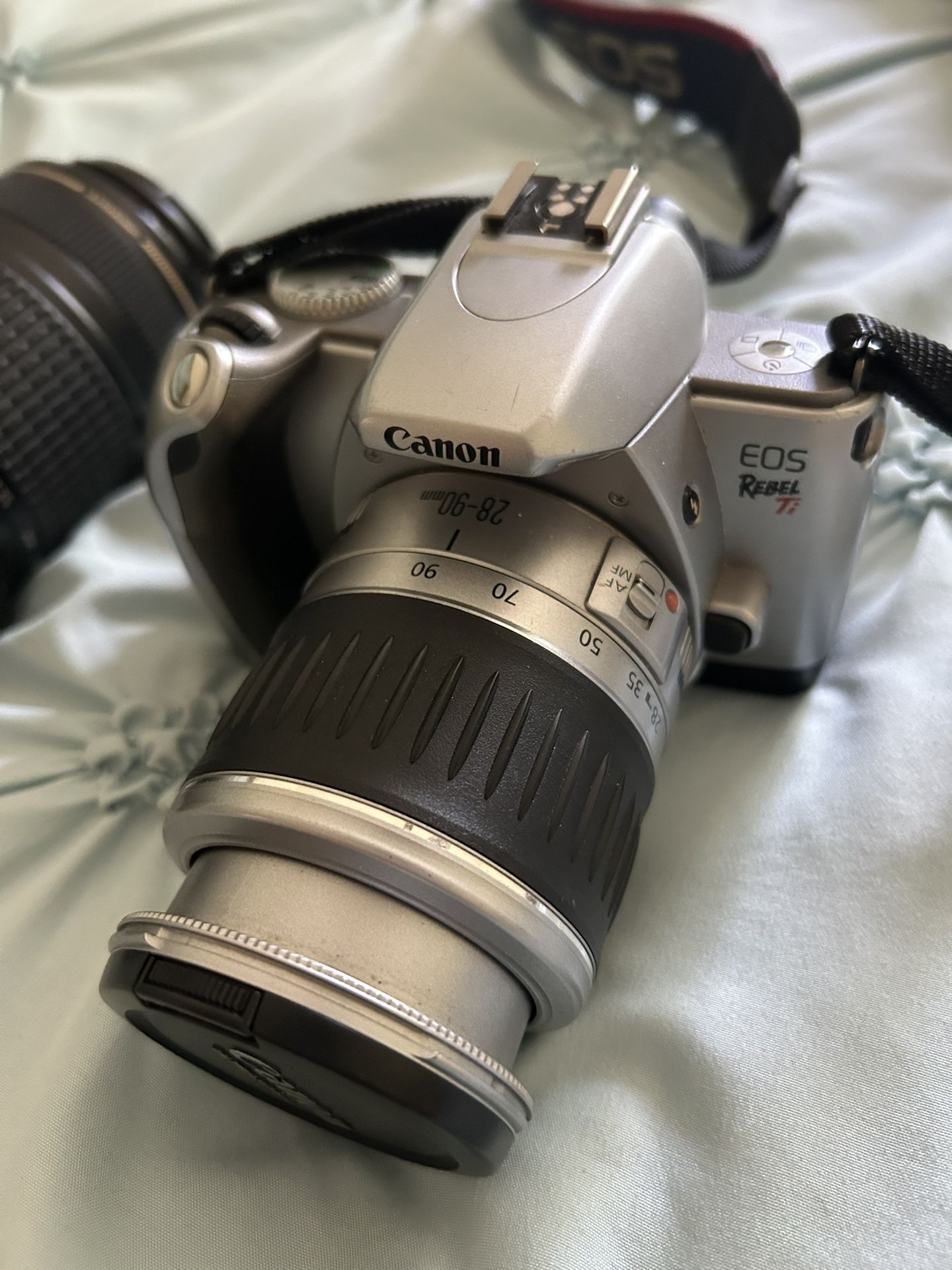 Canon Image Stabilizer And Rebel Camera 77