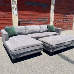 Living Spaces Gray Sectional Sofa Chaise With Ottoman