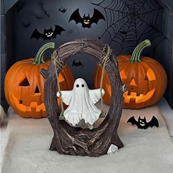 Halloween small ghost on a swing
