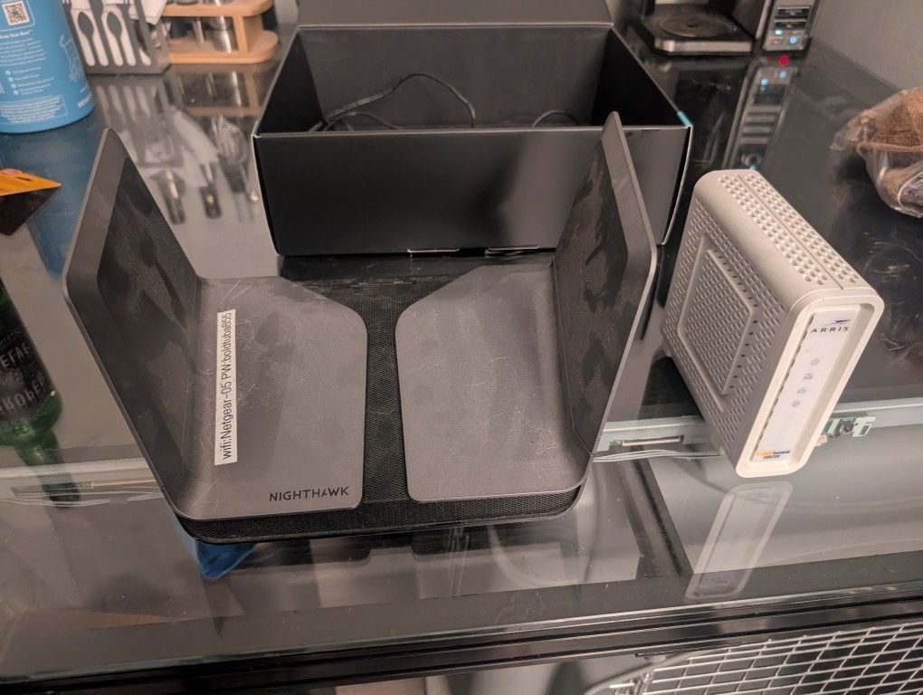 Netgear Nighthawk WiFi Router And Arris Modem
