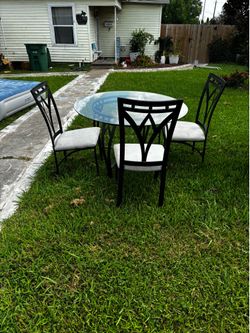 Dinning table and 3 chairs only