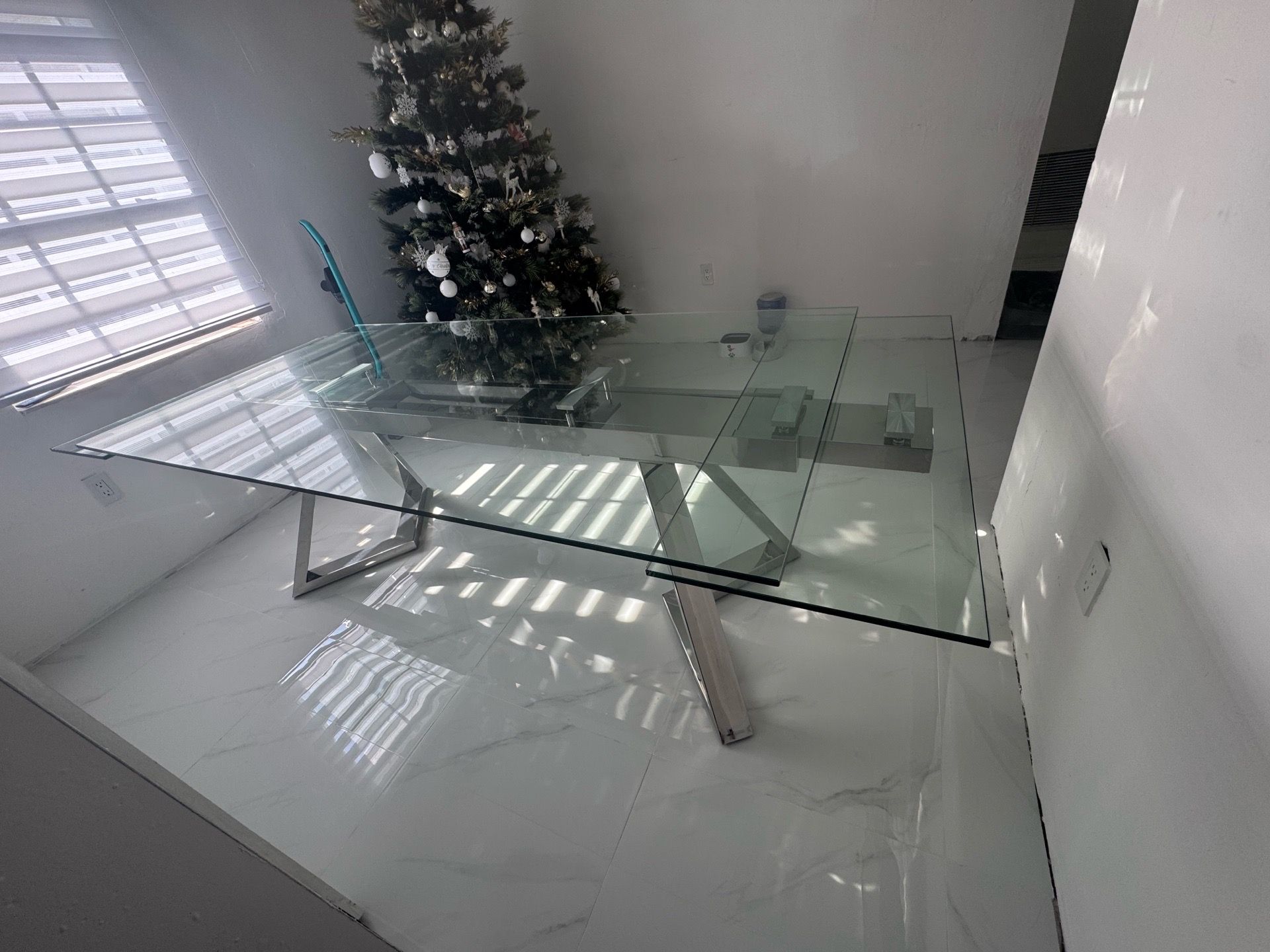 Glass and steel dinning table from el dorado
