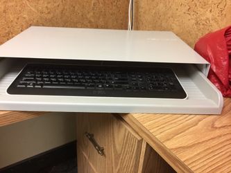 Computer keyboard housing unit for desk