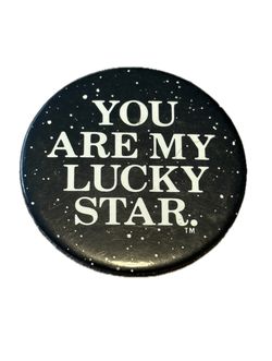 Collectible pin-back button with 'YOU ARE MY LUCKY STAR' text from the 1978 film Alien