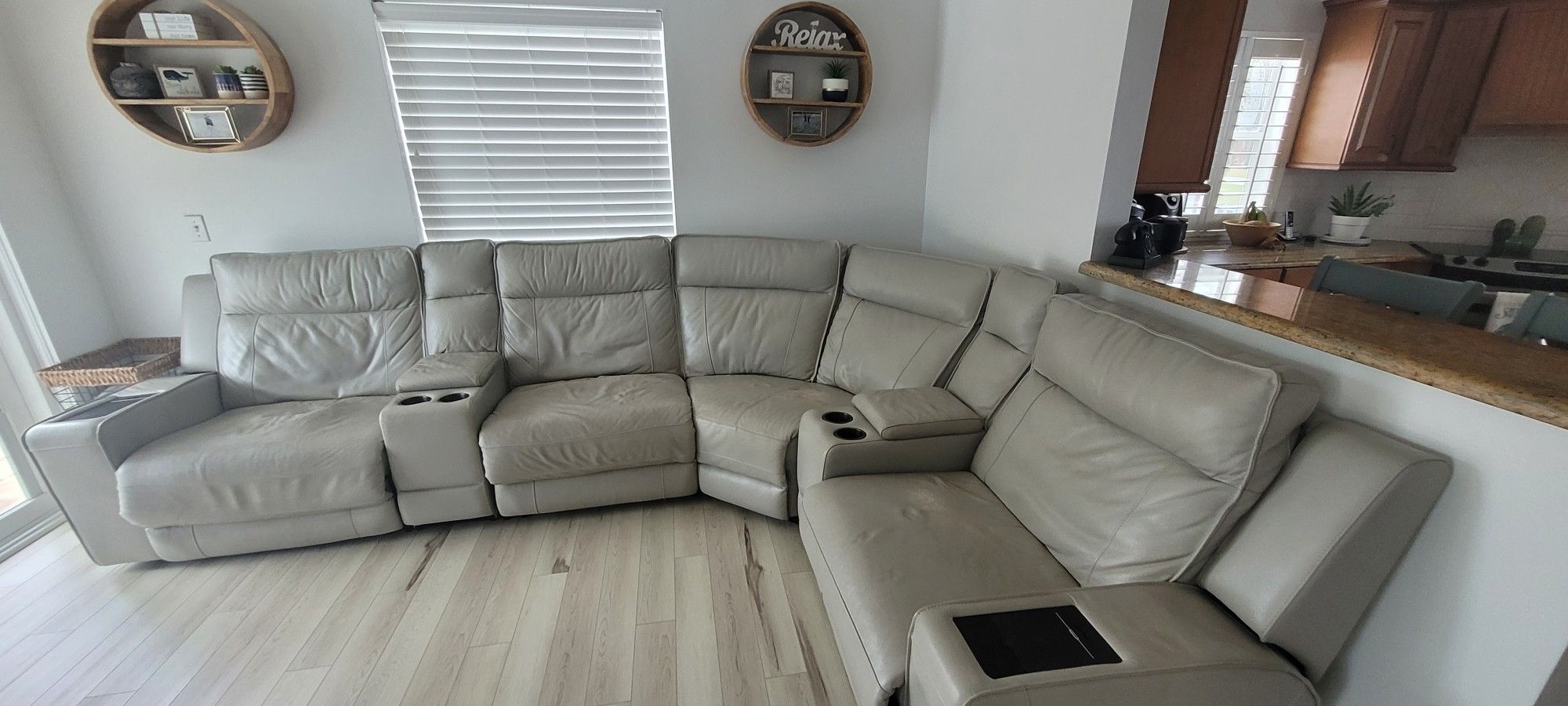 Kanes Leather Reclining Electric Sectional for Sale in Melbourne, FL OfferUp