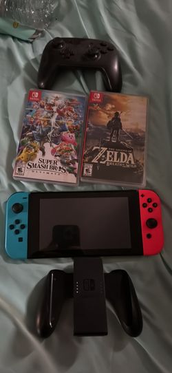 Nintendo Switch With Pro Controller And Two Games