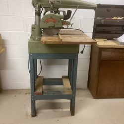 Dewalt Radial Arm Saw With Extra Blades and many attachments 