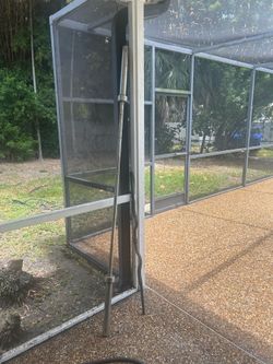 7 ft Olympic barbell and a black EZ curl bar