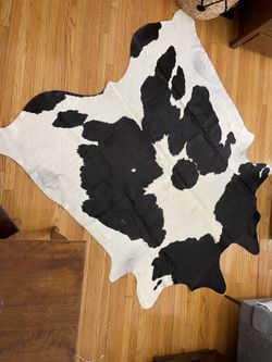 NATURAL COW HIDE RUG MUST GO