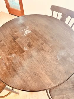 Dining table with four stools