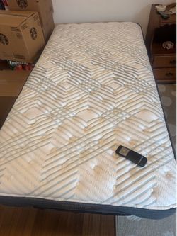 Like New Twin Adjustable Bed frame & Mattress
