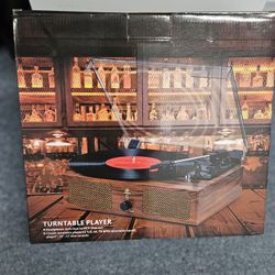 Udreamer Vinyl Record Player, a portable turntable with built-in speakers