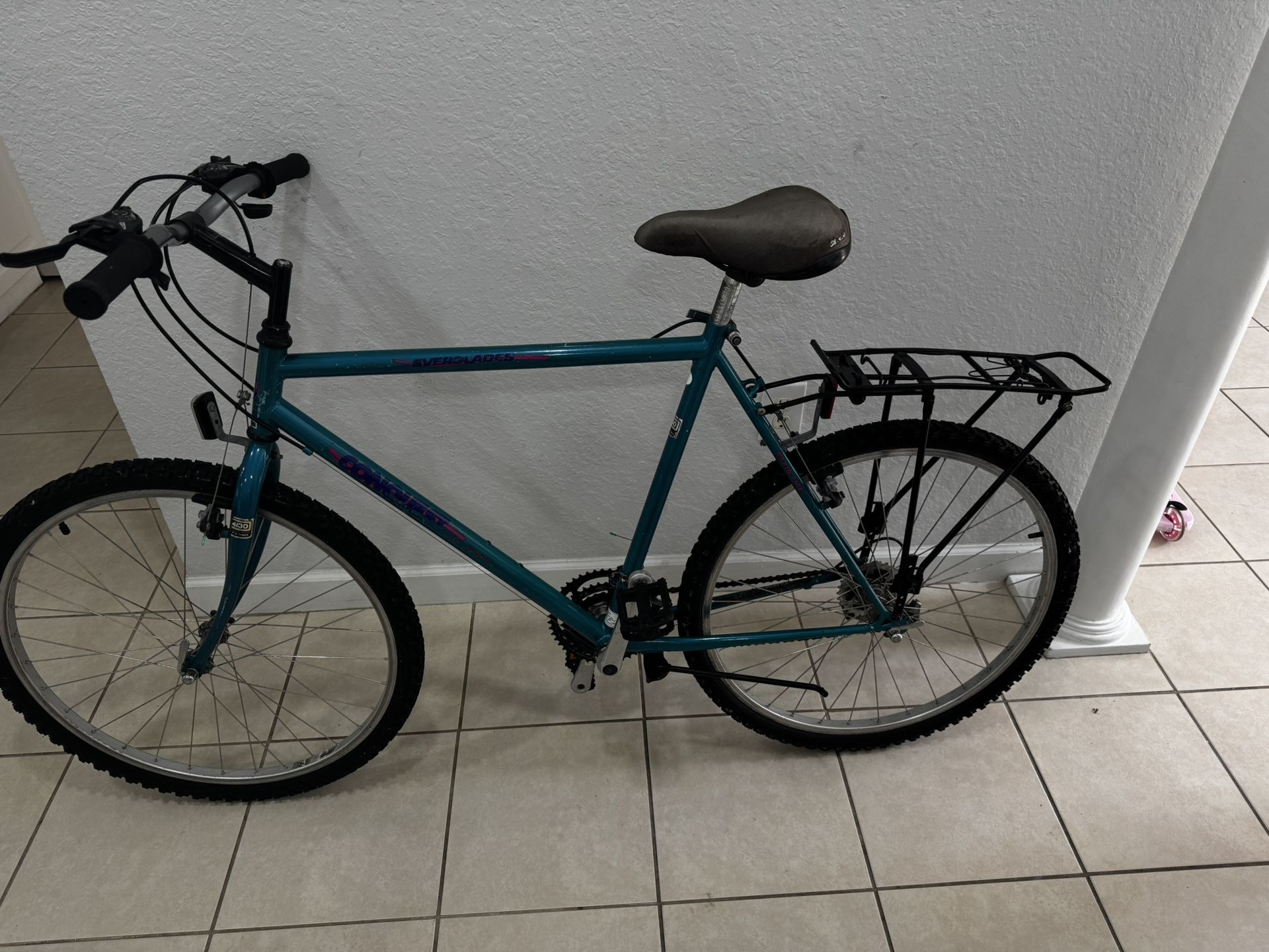 Mountain Bicycle Conquest . Rim 26”. Good Tires . Need Adjust The Gears. Location West Kendall 33194