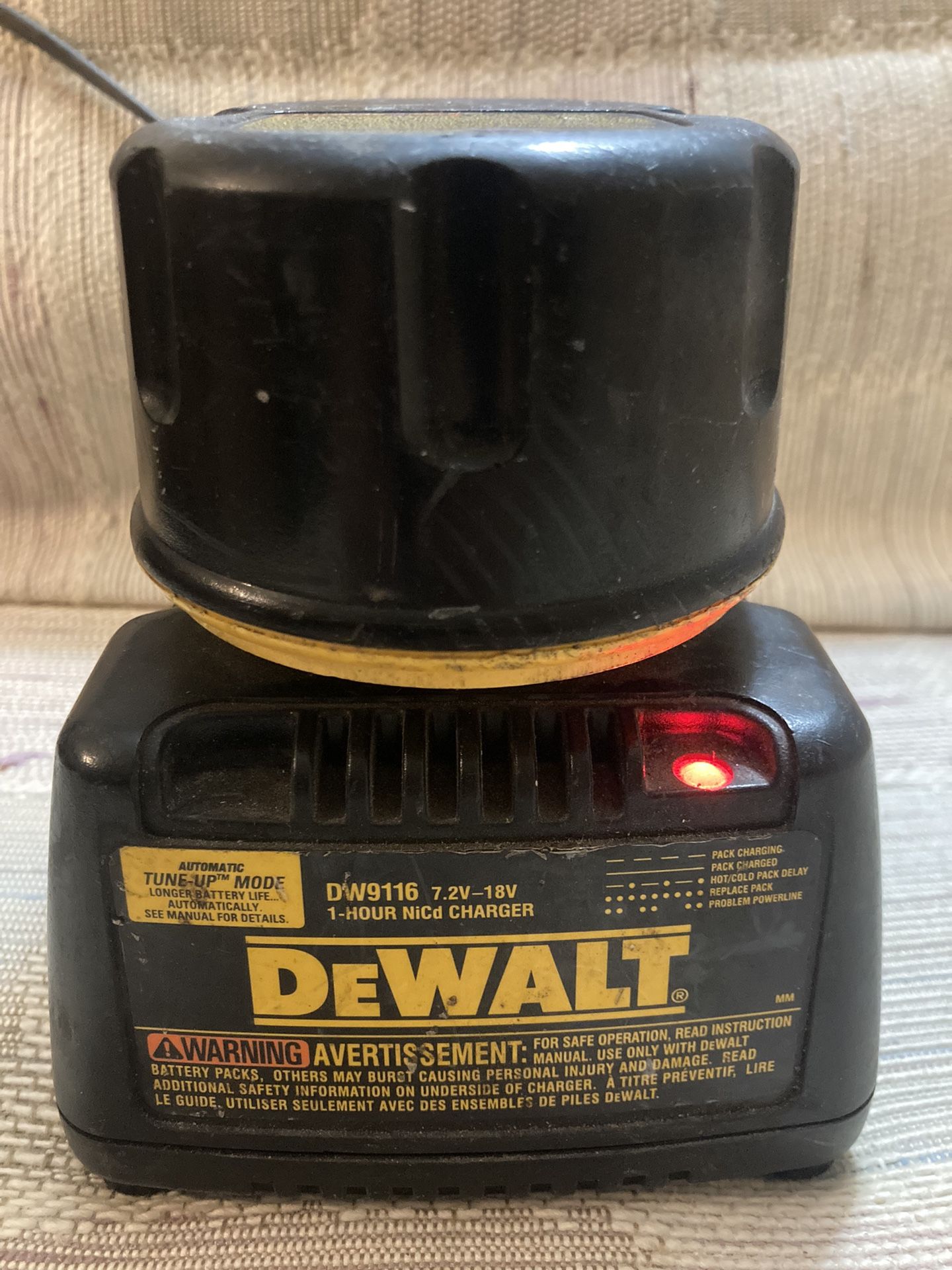 dewalt DW9116 1 hour charger + Battery . Battery won’t last too long(is dying)!