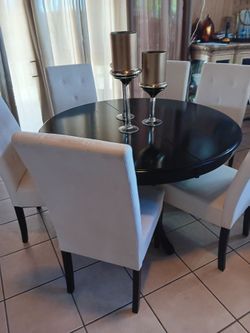 Comedor con 6 sillas  se extiende