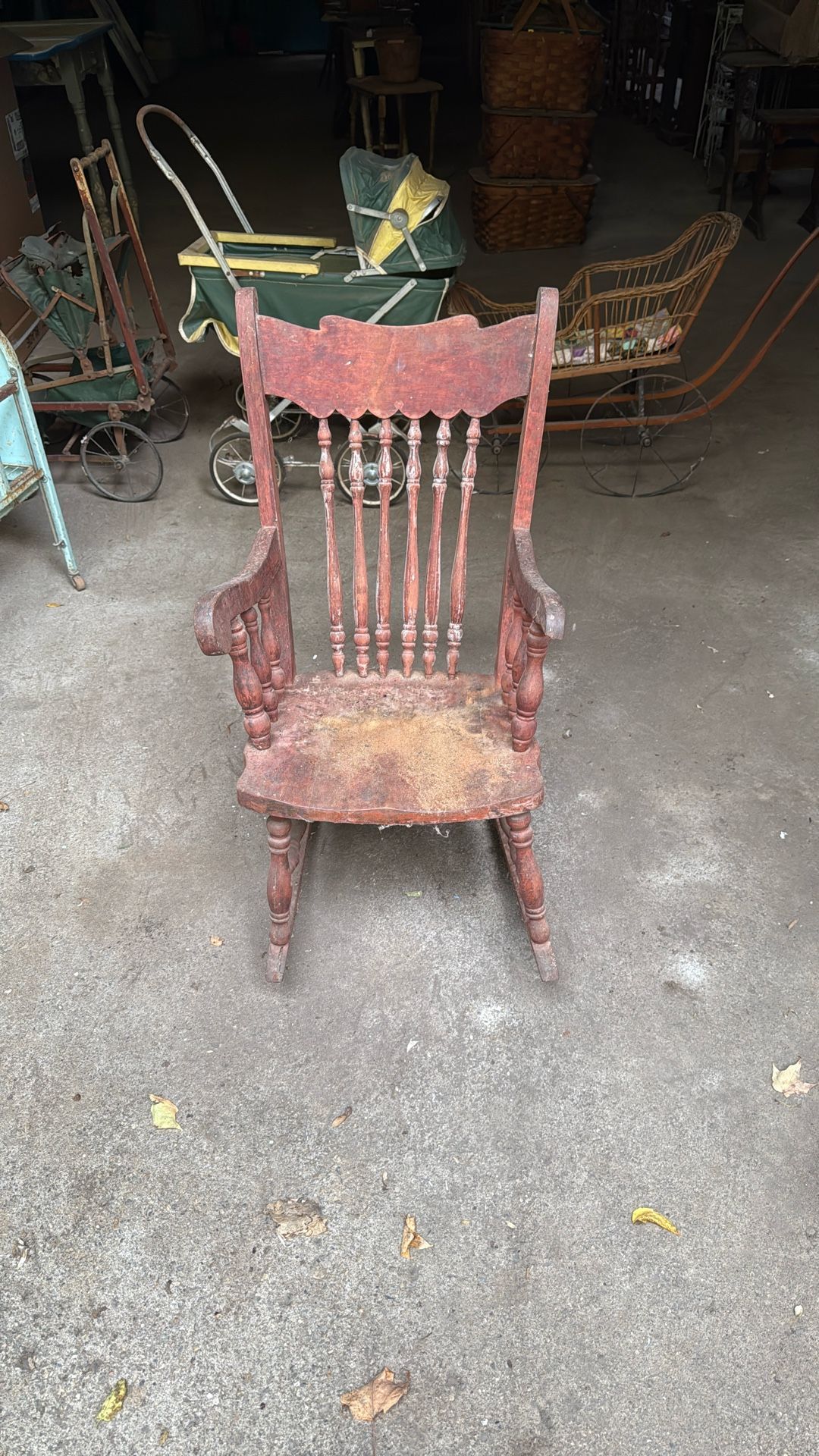 Antique children’s spindle rocking chair