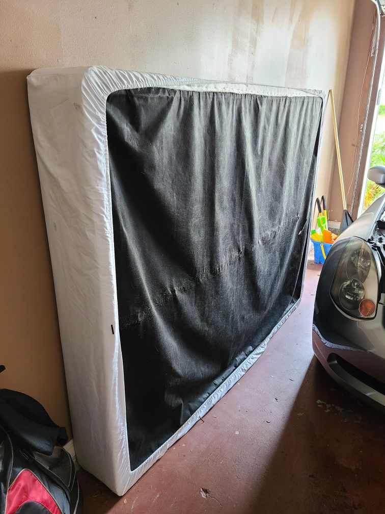 Free queen size box spring. Normal wear. Must pick up.
