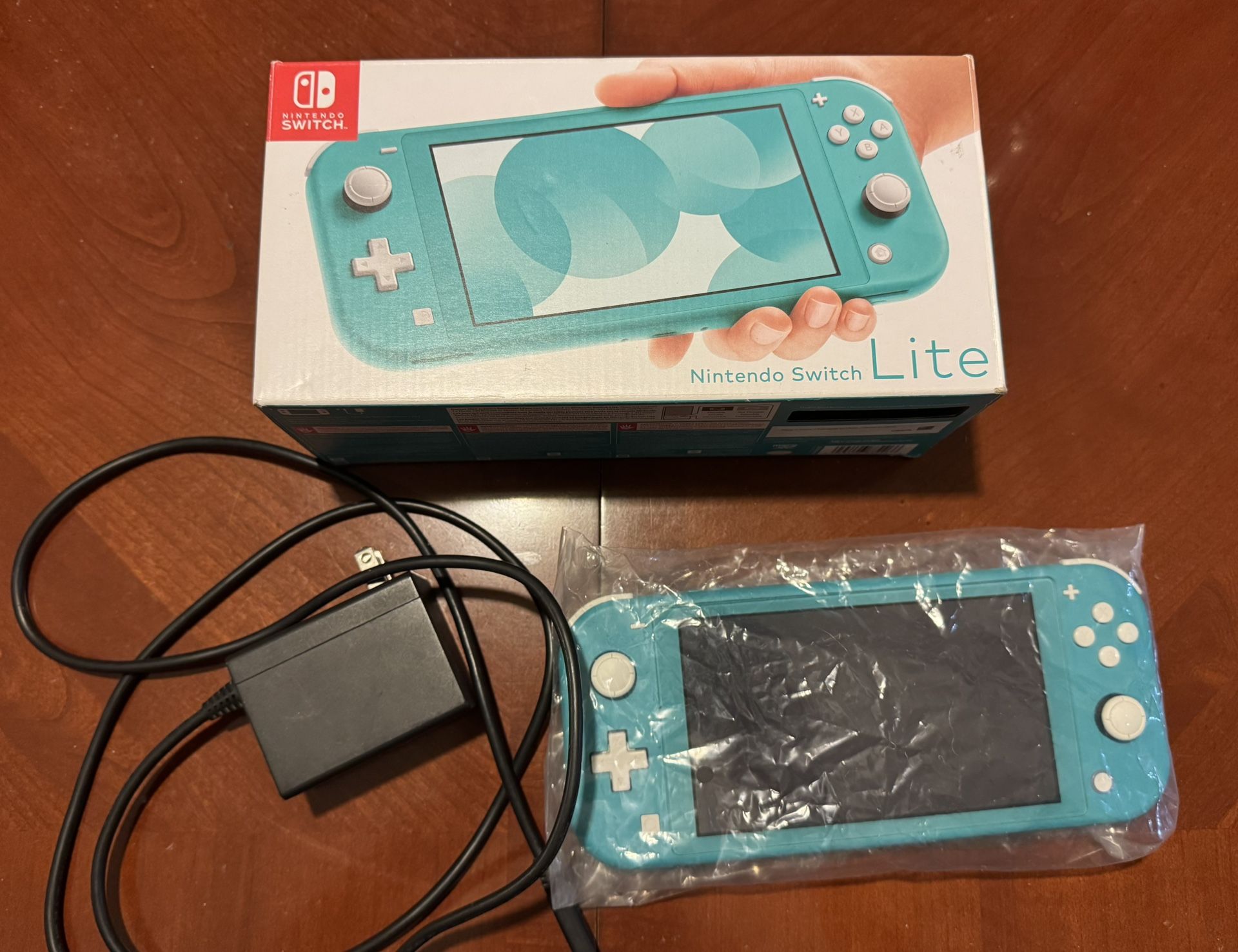Turquoise Nintendo Switch Lite in Box w/ Charger