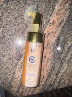 Frozen gold facial cleanser /with brush head.