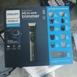 NEW PHILLIPS NORELCO ALL IN ONE TRIMMER. 24 TOOLS & ACCESSORIES